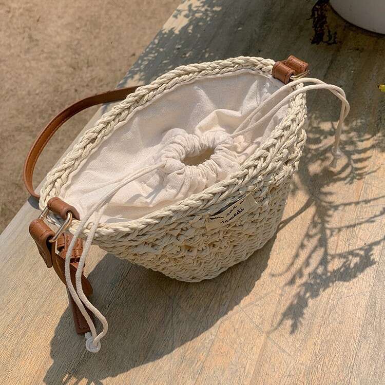 Niche Woven for Women 2025 Summer New Casual Straw Hollow Beach Mini Shoulder Crossbody New Bucket Bag
