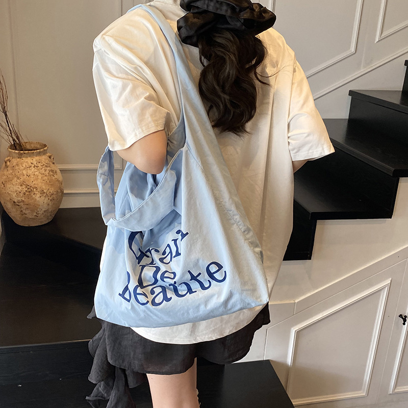 Free shipping designer Canvas Bag for Women Large Capacity 2025 New Lightweight Casual Commuter Shoulder Bag Outdoor Travel High-end Tote Bag