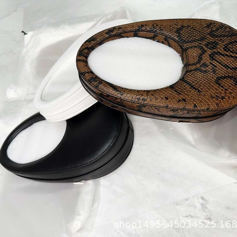 Small retro women's hand-held leather cowhide snake pattern three-dimensional egg and egg bag small round bag