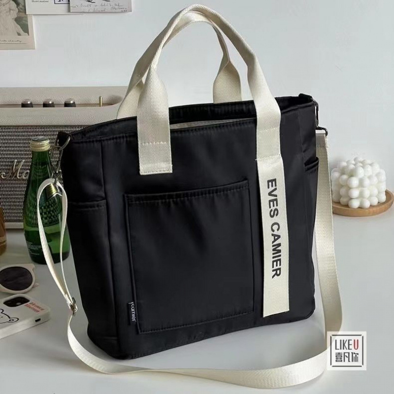Free Shipping 2025 New Designer Bag Waterproof Canvas Fashion Handbag Simple Multi Functional Shoulder Bag Handheld Leisure High Quality Shopping Bag