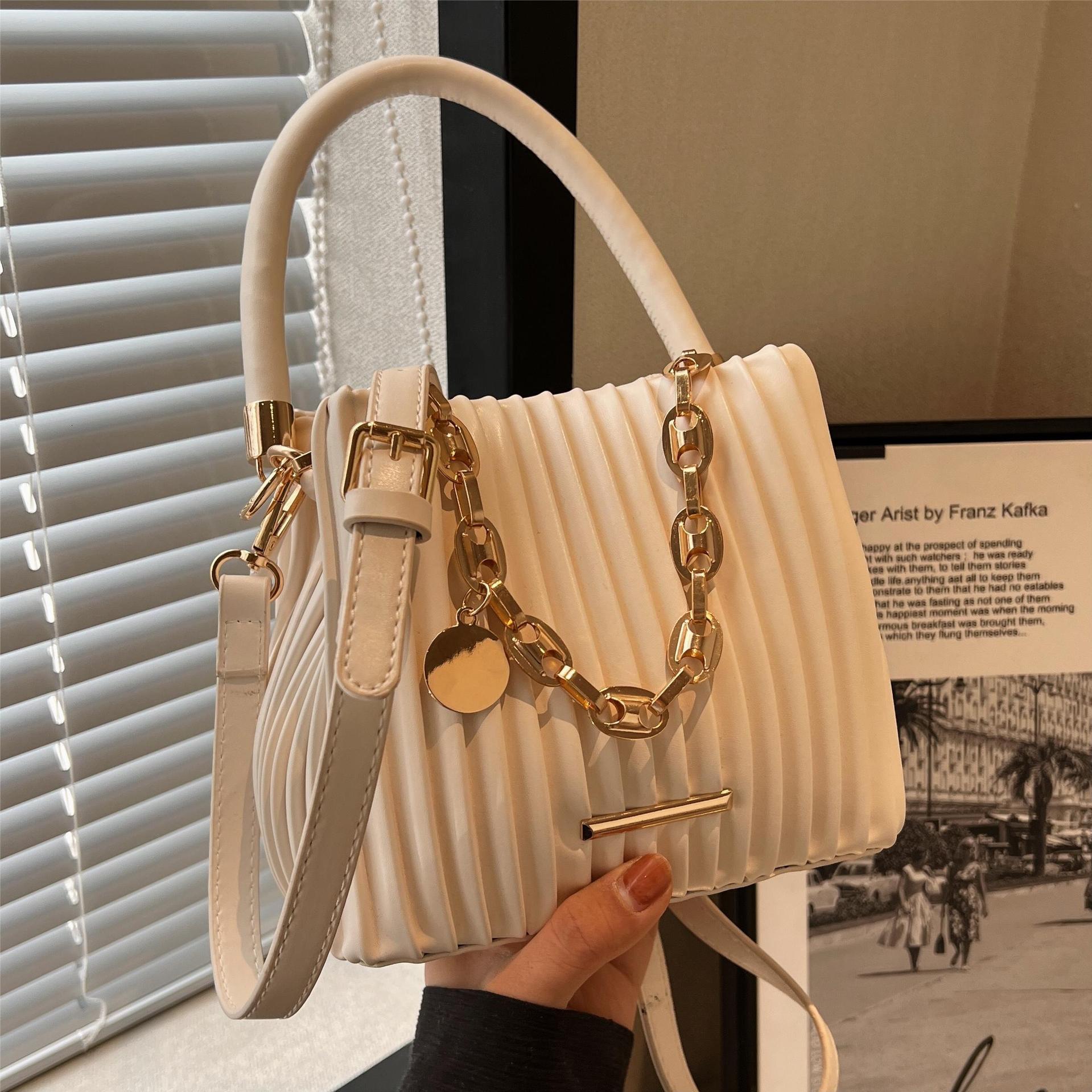 Free shipping designer Unique Designer Bucket Bag 2025 New Versatile Pleated Stylish Crossbody Bag Internet Celebrity Handbag Women Bag