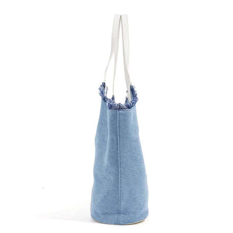 Vacation Beach Handbag Denim Underarm 2025 New Niche Large Capacity Vintage Tassel Tote Bag Genuine Leather Splicing Ladies