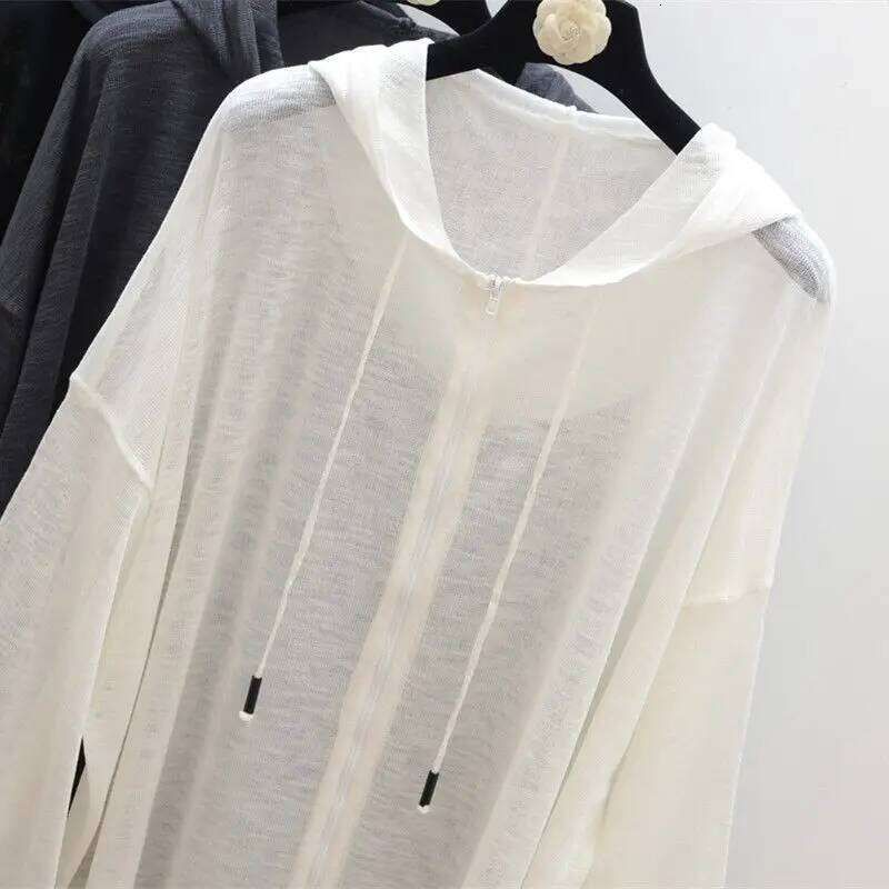 Chic Feminine Apparel Collection Featuring Layered Transparent Coats Contemporary City Chic Outfits