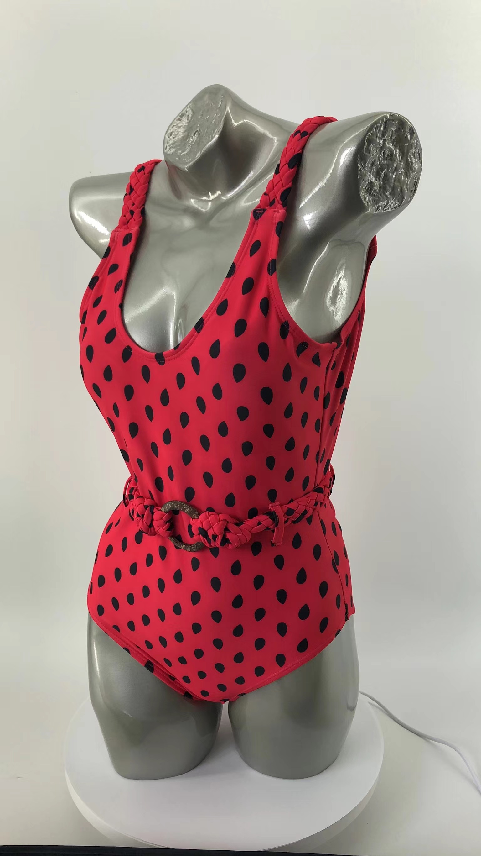 Chic Swimming Costume by Polka Dot Brand Featuring Intriguing Details