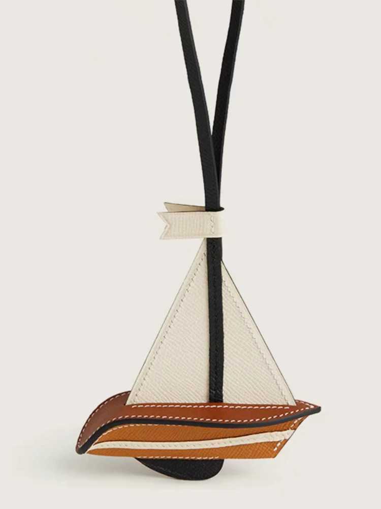 Newly Sailboat Bag Charms Pendant Smooth Sailing Handmade Genuine Cowhide Car Hanging High Quality Key Chain Bags Accessories XJ250619