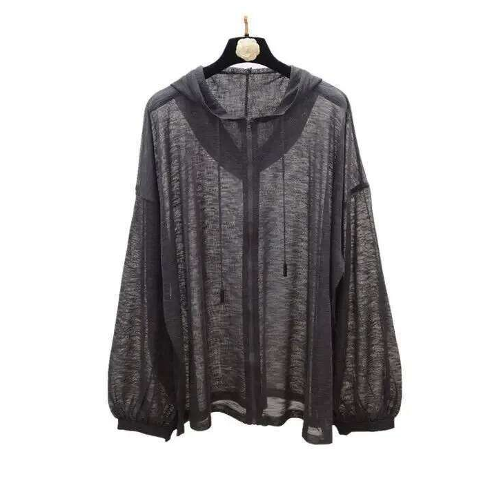 Chic Feminine Apparel Collection Featuring Layered Transparent Coats Contemporary City Chic Outfits