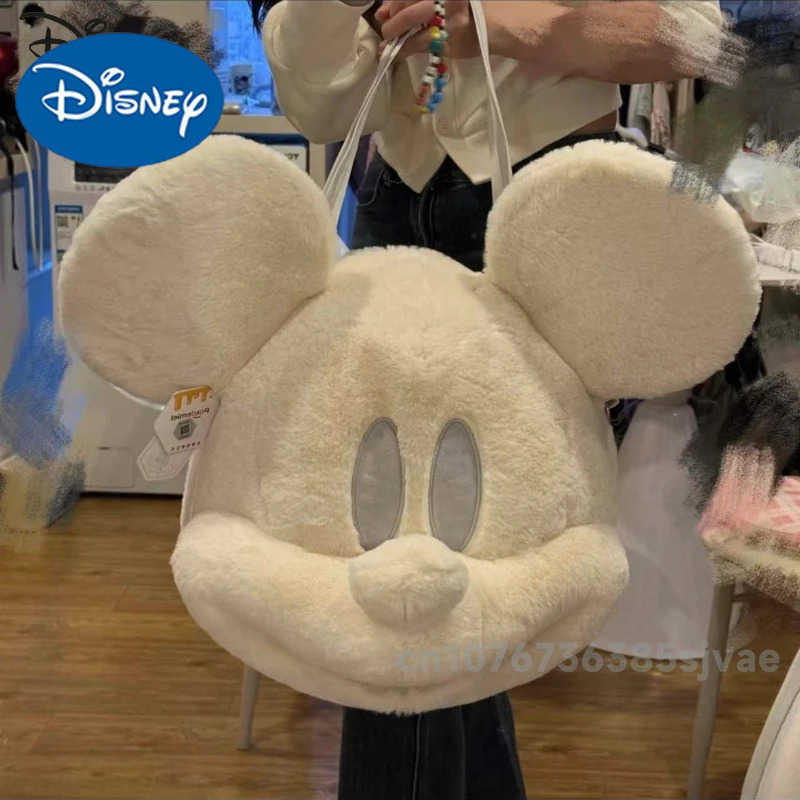 DISNEY Mickey 2025 New Womens Handheld Doll Bag Fashion High Quality Womens Shoulder Bag Solid Color Versatile 3D Doll Storage Bag W250620