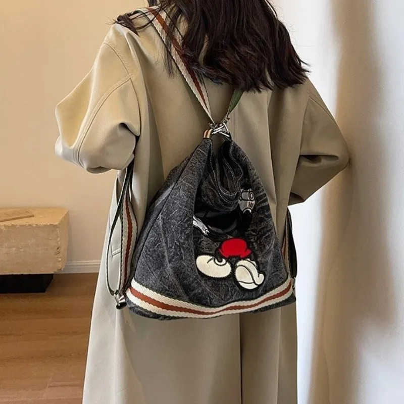 Disney Mickeys new large-capacity womens canvas denim bag college student fashion commuter shoulder bag W250620