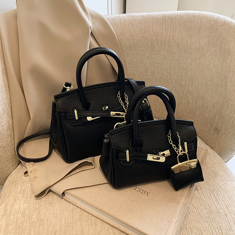 Free shipping designer New Fashion Handbag Kelly Bag Women Bag Niche High-end Large Capacity Bag Niche Shoulder Bag Crossbody Bag Commuter Bag