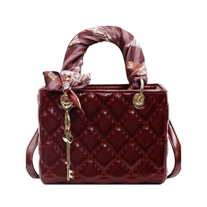 Free Shipping 2025 New Designer Fashionable High-quality Shopping Bags High-end Solid Color Key Pendants Small And Large Women's Handbags