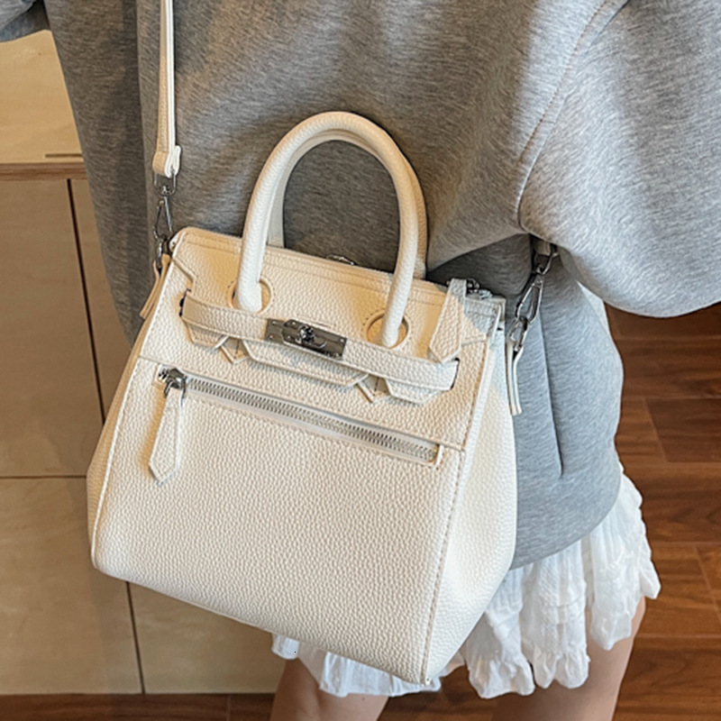 Free shipping designer Bag Korean Niche Lightweight Shoulder Bag Women Bag 2025 New Commuter Handbag Lychee Pattern Convertible Backpack Tote Bag