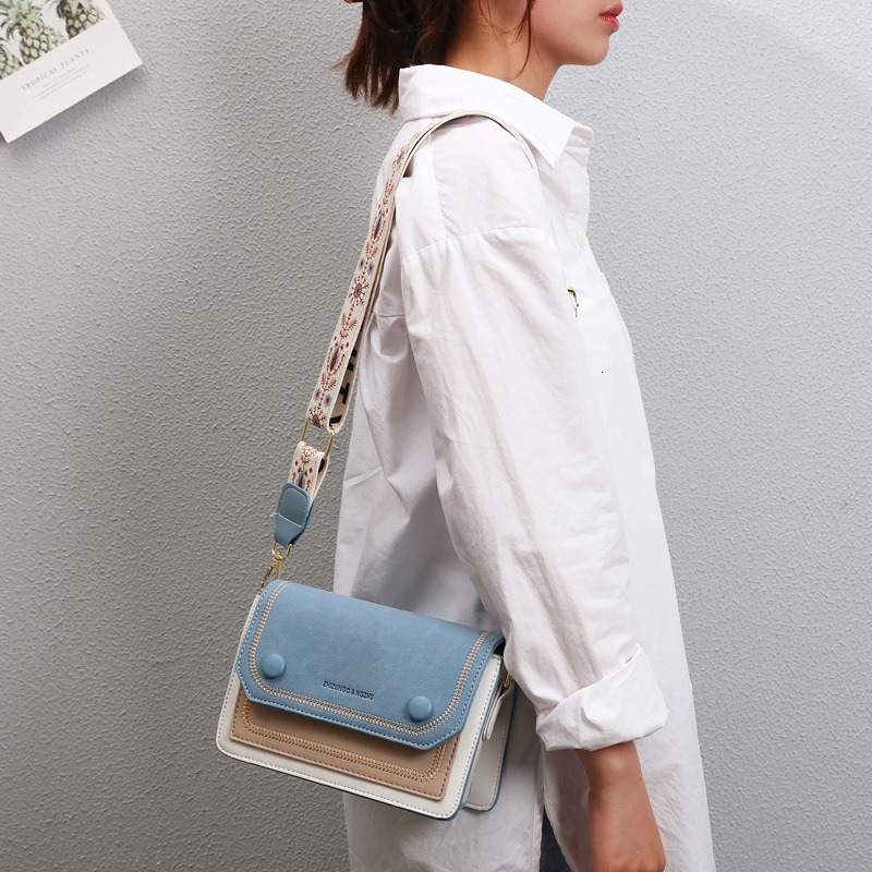 Free Shipping 2025 Summer New Designer Bag Fashionable And High-quality Shopping Bag High-end Niche Color Blocked Women's Single Shoulder Handbag