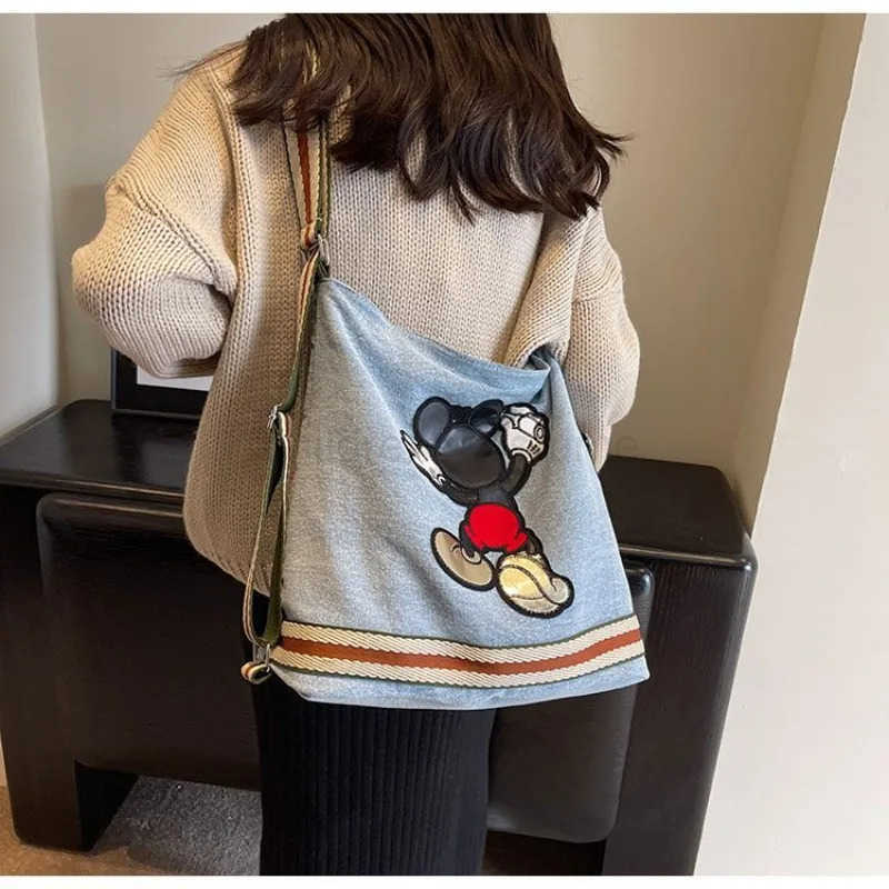 Disney Mickeys new large-capacity womens canvas denim bag college student fashion commuter shoulder bag W250620