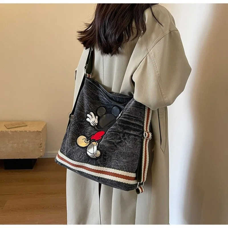 Disney Mickeys new large-capacity womens canvas denim bag college student fashion commuter shoulder bag W250620