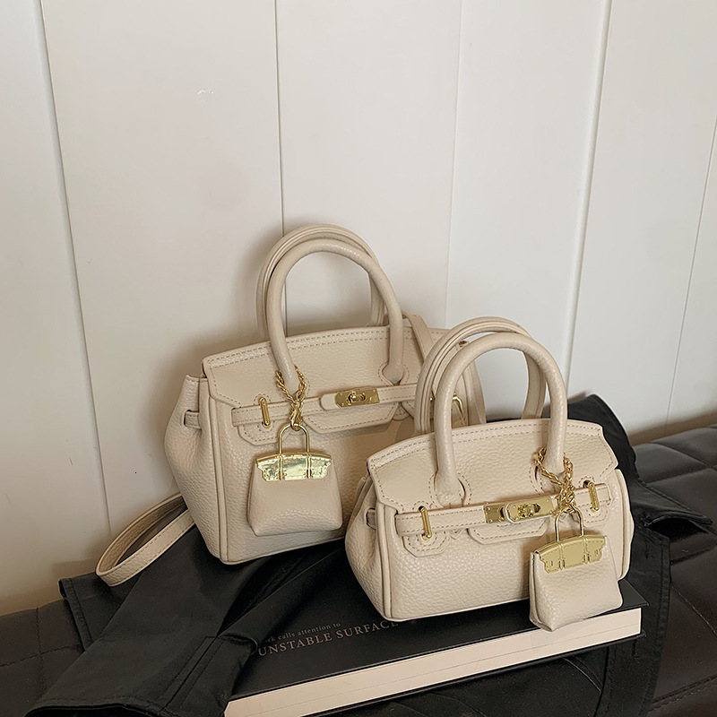 Free shipping designer New Fashion Handbag Kelly Bag Women Bag Niche High-end Large Capacity Bag Niche Shoulder Bag Crossbody Bag Commuter Bag