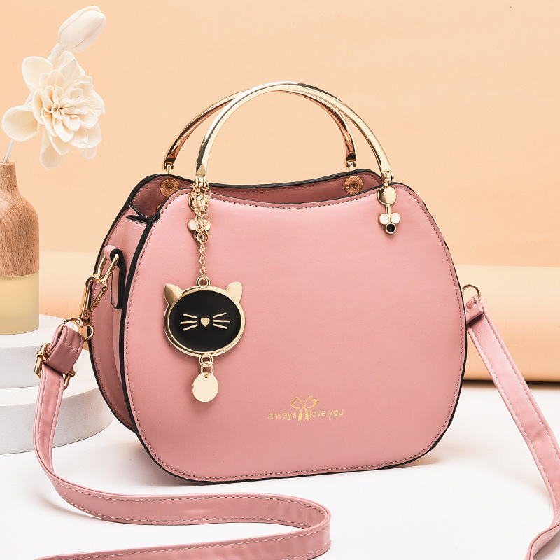 Free Shipping 2025 New Designer Bag High-end Solid Color Cat Pendant Women's Shell Handbag Fashionable And High-quality Shopping Bag