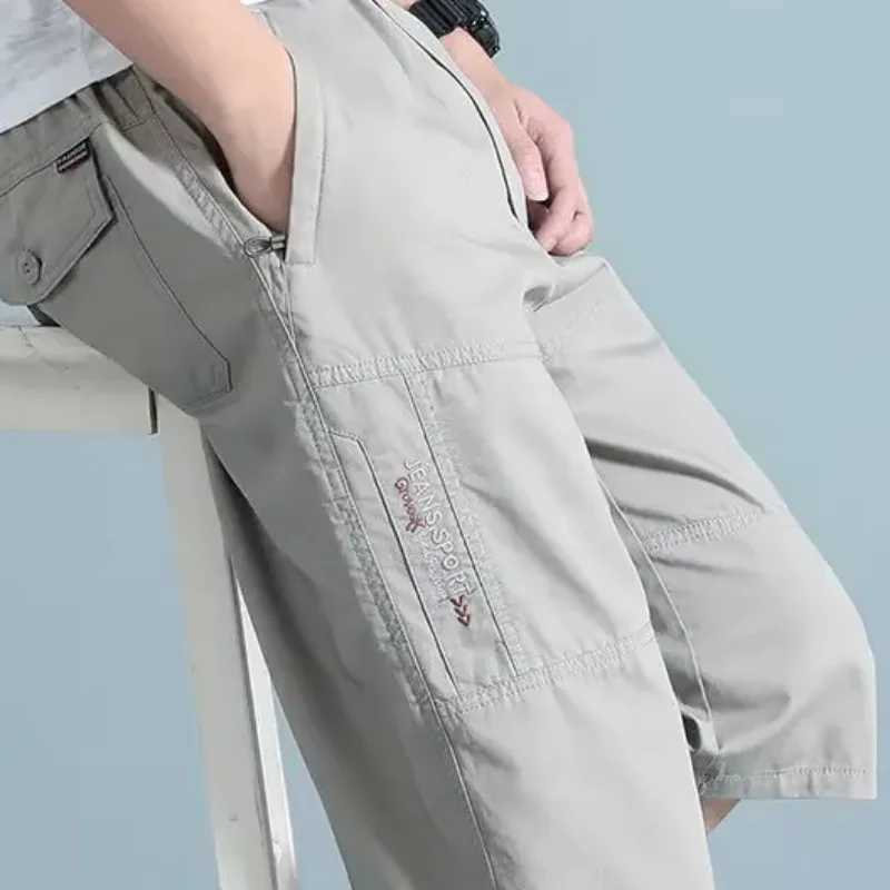 2025 New Mens Cargo Shorts Knee Pants Multiple Zipper Pocket Summer Cotton Shorts Climbing Jogger Elastic Waist Sports Wear W250621