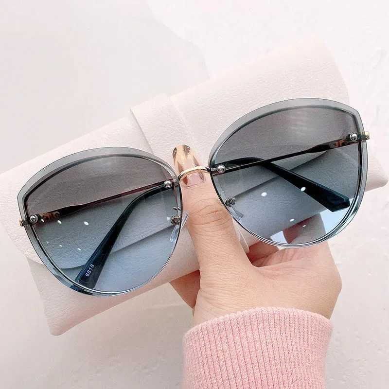 High Quality Womens Oval Rimless Sunglasses Lady Metal Cat Eye Shades for Women Driving Glasses Sunglasses for Women W250621