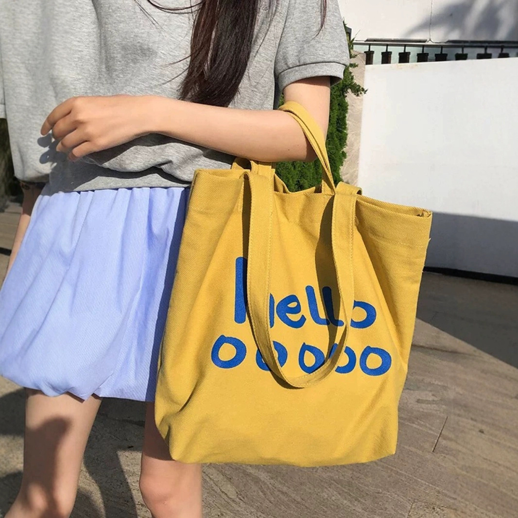 Free shipping designer Korean New Canvas Bag Large Capacity Single Shoulder Letter Tote Bag Simple Casual Trendy Bag Student Shopping Bag Trendy