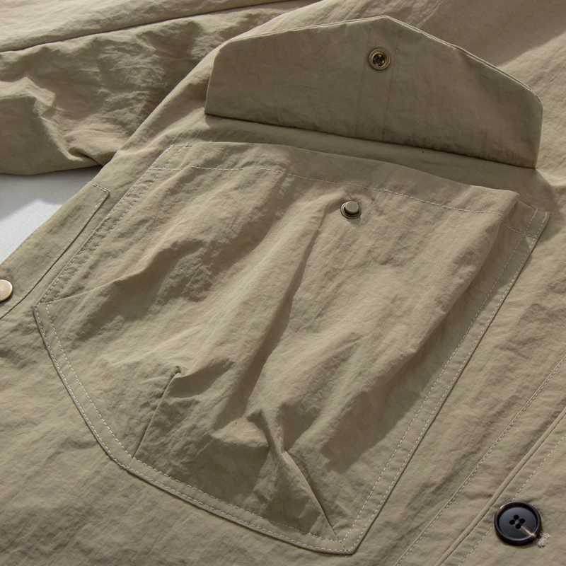 New 2025 Japanese Work Jacket Mens Outdoor Functional Three-proof Loose Multi-pocket Loose Casual Thin Collarless Mens Jacket XJ250621