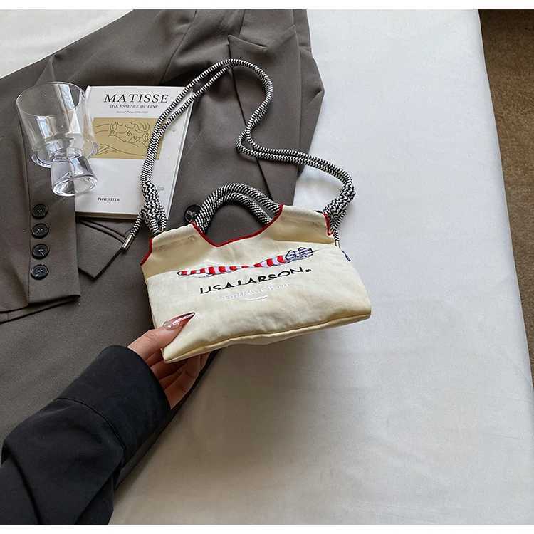 Embroidered canvas bag for women; light single shoulder bag for spring and summer; cross-body handbag. XJ250620