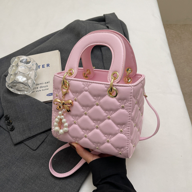 Free Shipping 2025 New Designer Bag Casual Boutique Shopping Bag High-end Solid Color Lightweight Pearl Pendant Women's Handbag