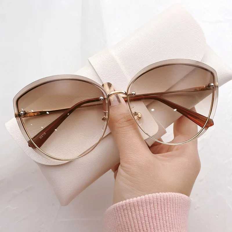 High Quality Womens Oval Rimless Sunglasses Lady Metal Cat Eye Shades for Women Driving Glasses Sunglasses for Women W250621