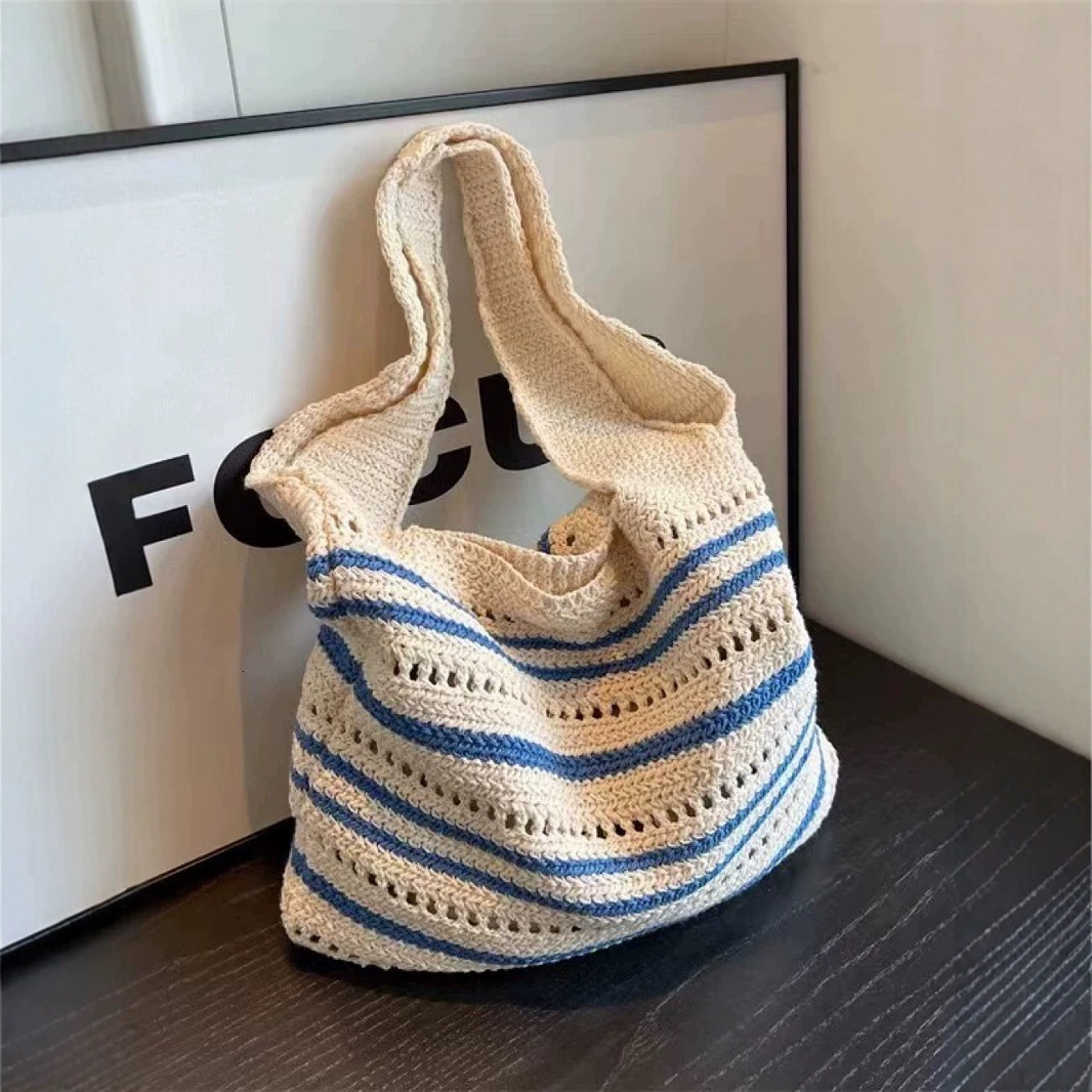 Free shipping designer Handmade Crochet Cotton Rope Woven Bag Large Capacity New Spring Summer Shoulder Handbag Hollow Out Vacation Bag