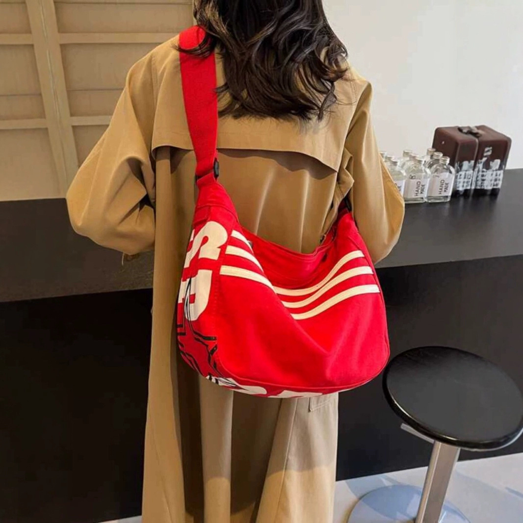 Free shipping designer Striped Canvas Bag for Women 2025 New Commuter Oxford Cloth Sports Dumpling Bag Casual Versatile Shoulder Bag Crossbody Bag