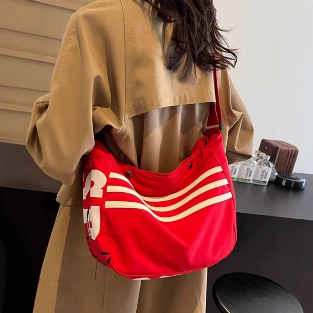 Free shipping designer Striped Canvas Bag for Women 2025 New Commuter Oxford Cloth Sports Dumpling Bag Casual Versatile Shoulder Bag Crossbody Bag