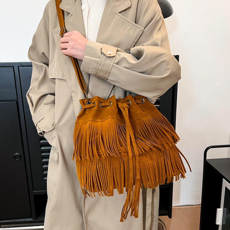 Free Shipping 2025 New Designer Bag Cross-border Women's Bag Simple Retro Tassel Drawstring Bucket Trendy High-quality Shopping Bags Single Shoul