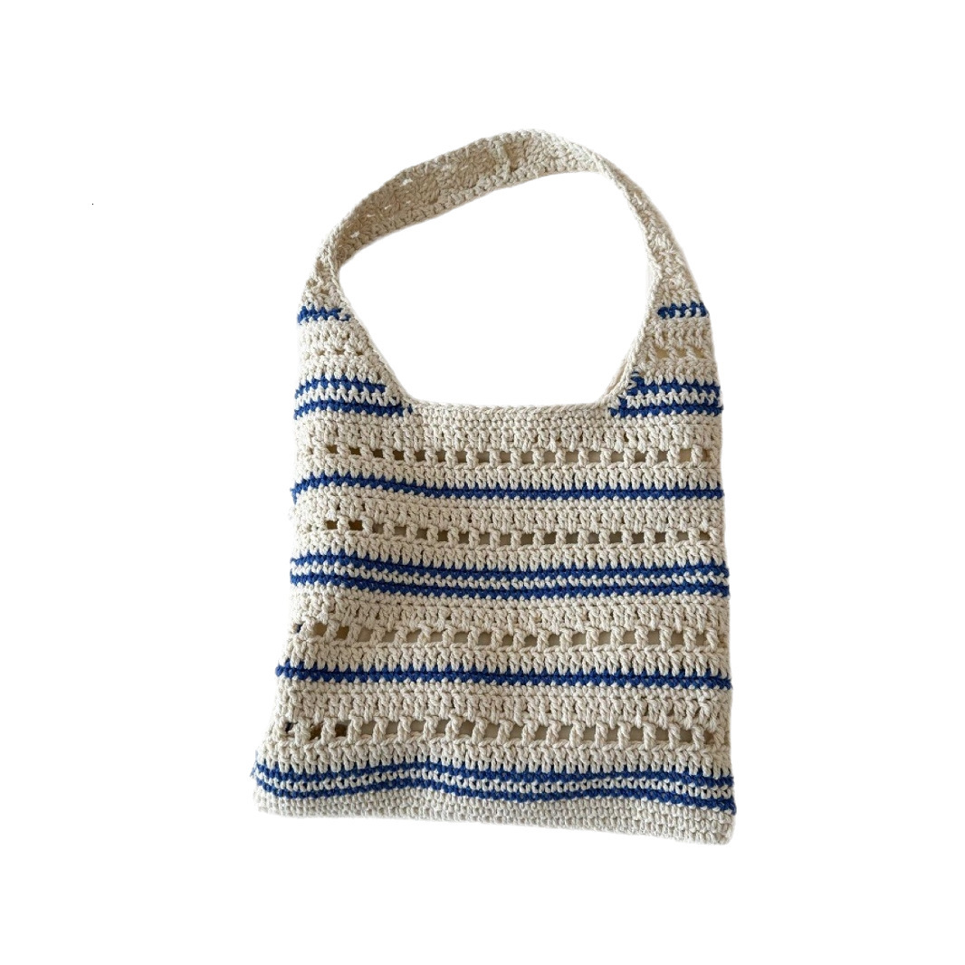 Free shipping designer Handmade Crochet Cotton Rope Woven Bag Large Capacity New Spring Summer Shoulder Handbag Hollow Out Vacation Bag