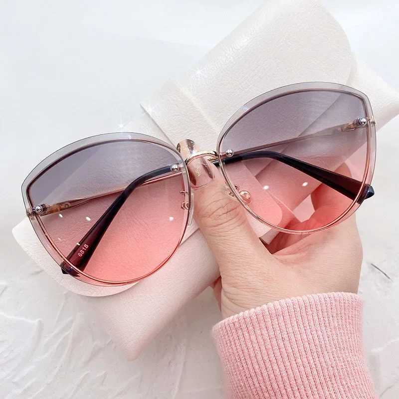 High Quality Womens Oval Rimless Sunglasses Lady Metal Cat Eye Shades for Women Driving Glasses Sunglasses for Women W250621