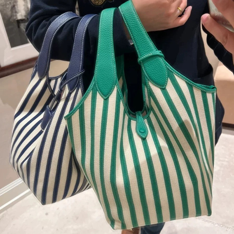 Free shipping designer bag 2025 New Vertical Striped Fashion Large Capacity Canvas Bag Ins Style Simple Letter Commuter Tote Bag Shoulder Bag