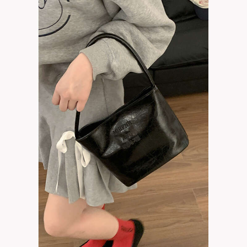 designer bag Fashion Silver Women's Underarm 2024 New Simple Bucket Niche Texture Shoulder Bag