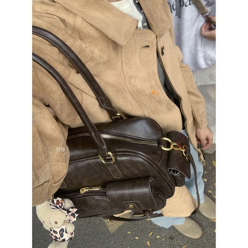 Handheld Bowling Ball for Women 2024 New Niche Texture Underarm Large Capacity Commuter designer bag Shoulder Bag