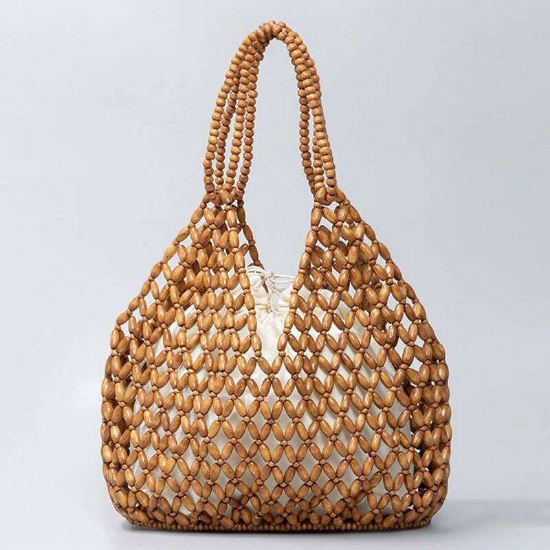 Designer straw bags Tote Bag Handmade Woven Women Handbag Exquisite Design Hollow-Out Wooden Beaded Shoulder Female