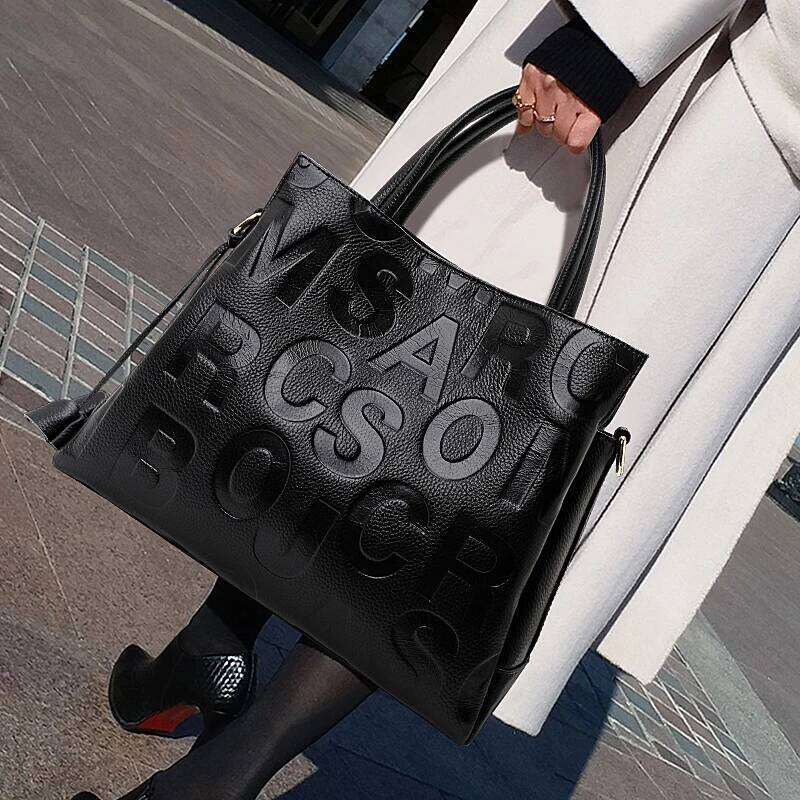 New Fashion Letter Printed Women's With High Quality And Large Capacity Cowhide Commuter Bag 2025/06/19
