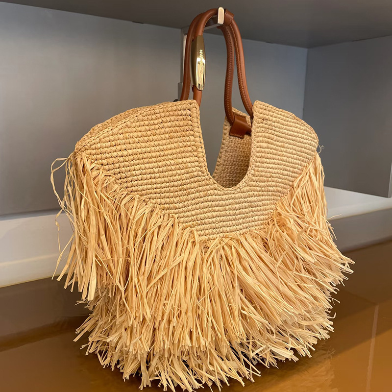 Free shipping designer bag Blogger Style Fashionable Straw Bag 2025 New Tassel Woven Bag Handbag Shoulder Bag Tote Bag Women Bag Personality