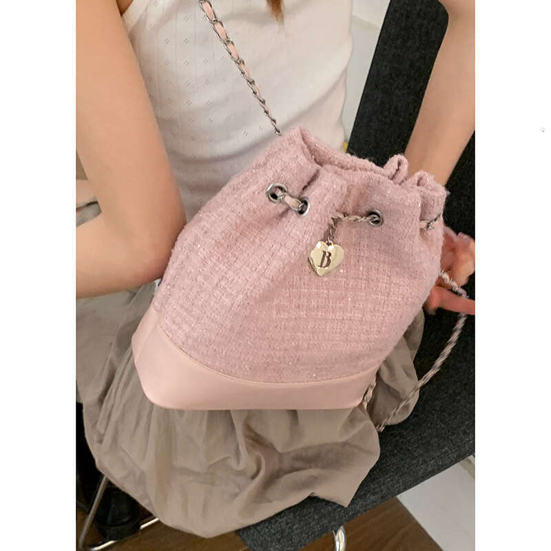designer bag Women's Small Backpack 2025 New Summer Fashion Niche Bucket Versatile Commuter Chain Shoulder Bag