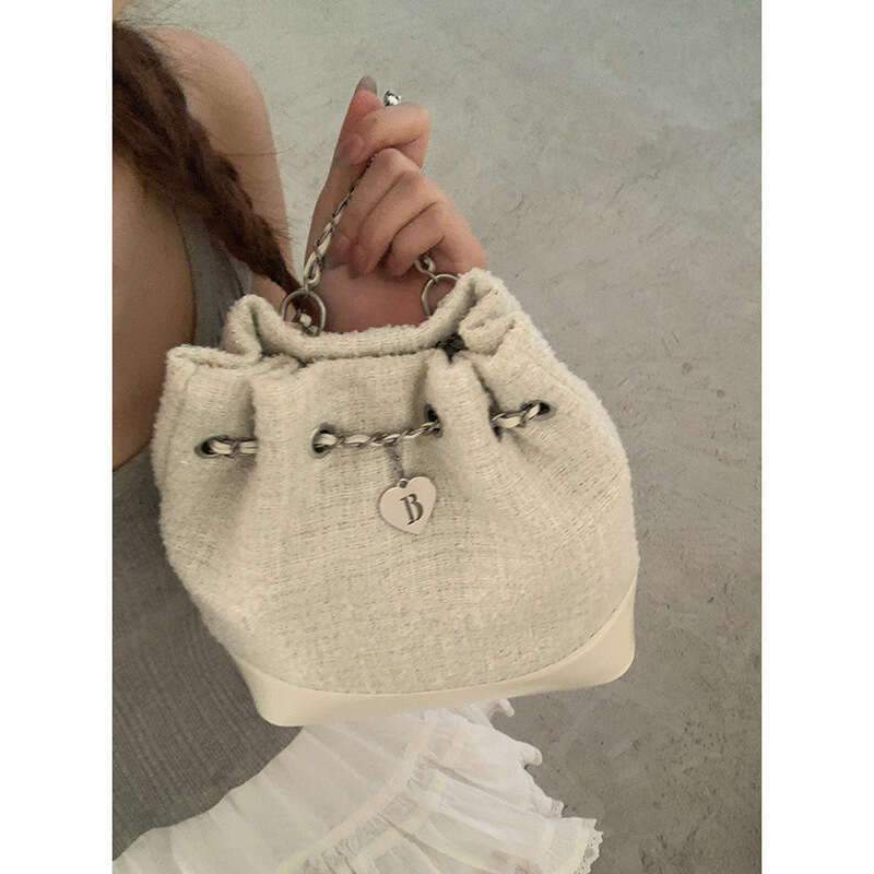 designer bag Women's Small Backpack 2025 New Summer Fashion Niche Bucket Versatile Commuter Chain Shoulder Bag