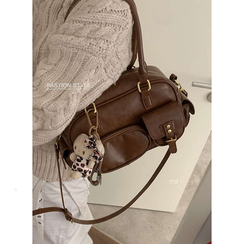 Handheld Bowling Ball for Women 2024 New Niche Texture Underarm Large Capacity Commuter designer bag Shoulder Bag
