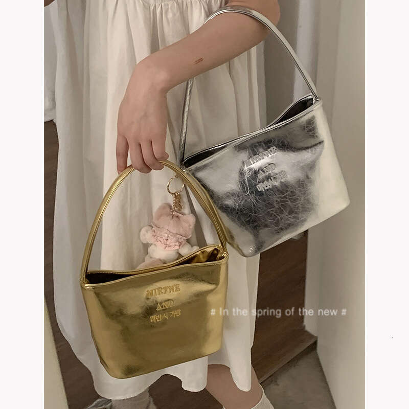 designer bag Fashion Silver Women's Underarm 2024 New Simple Bucket Niche Texture Shoulder Bag