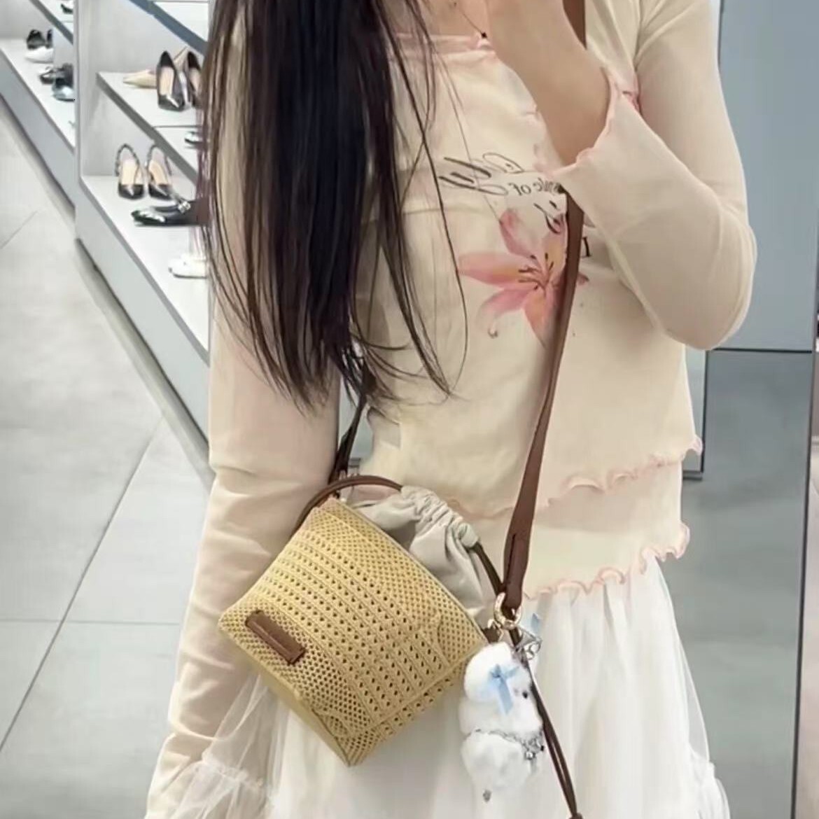 free shipping designer 2025 luxury New Hollow Woven Bag for Women, Light Luxury Niche High-end Vacation Beach Bag with Drawstring Crossbody Bucket Bag