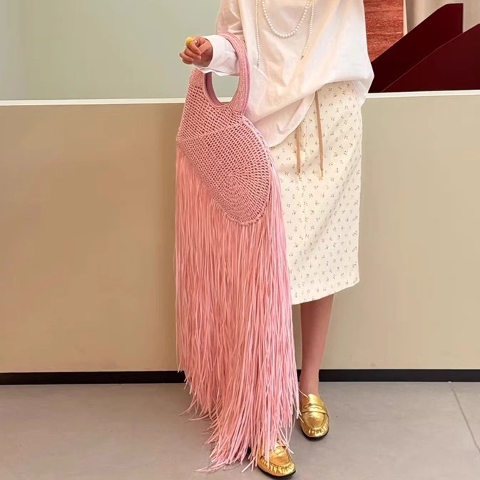 Free shipping designer bag 2025 New Blogger Style Tassel Woven Handbag Fashionable Heart-shaped Handheld Large Bag for Women Unique Trendy