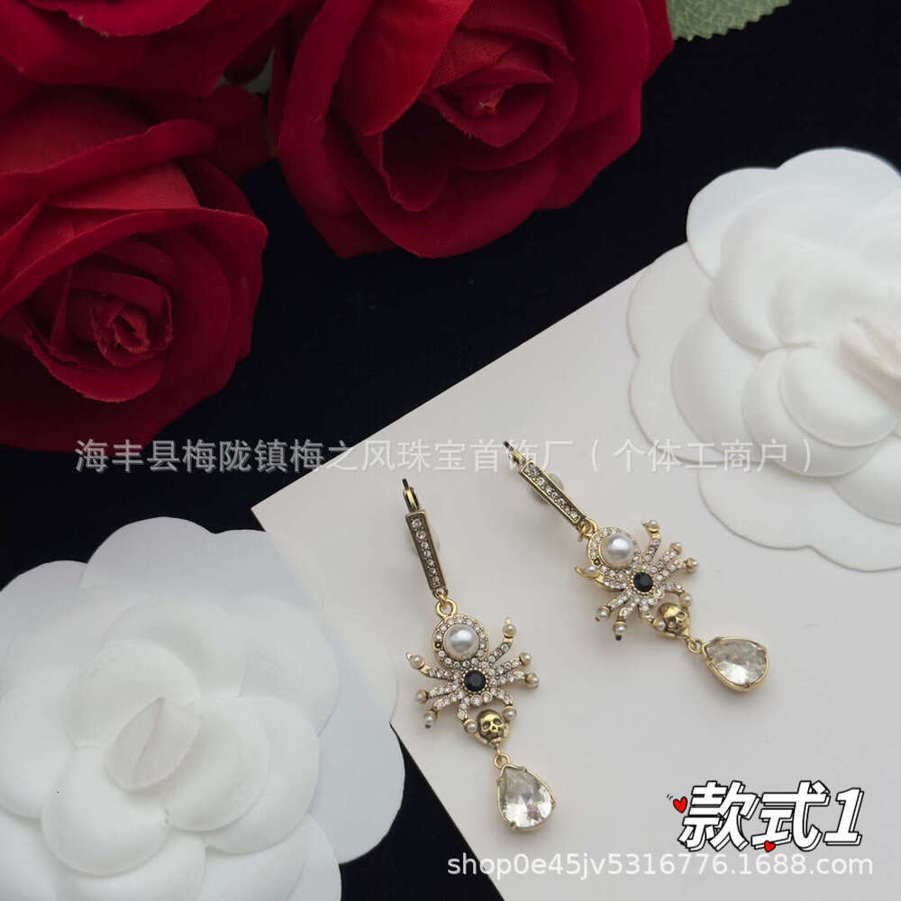 Upmarket Maijia High Version Ghost Skull Head Brass Material Spirit Snake Eagle Claw Exaggerated Long Earrings Sier Needle