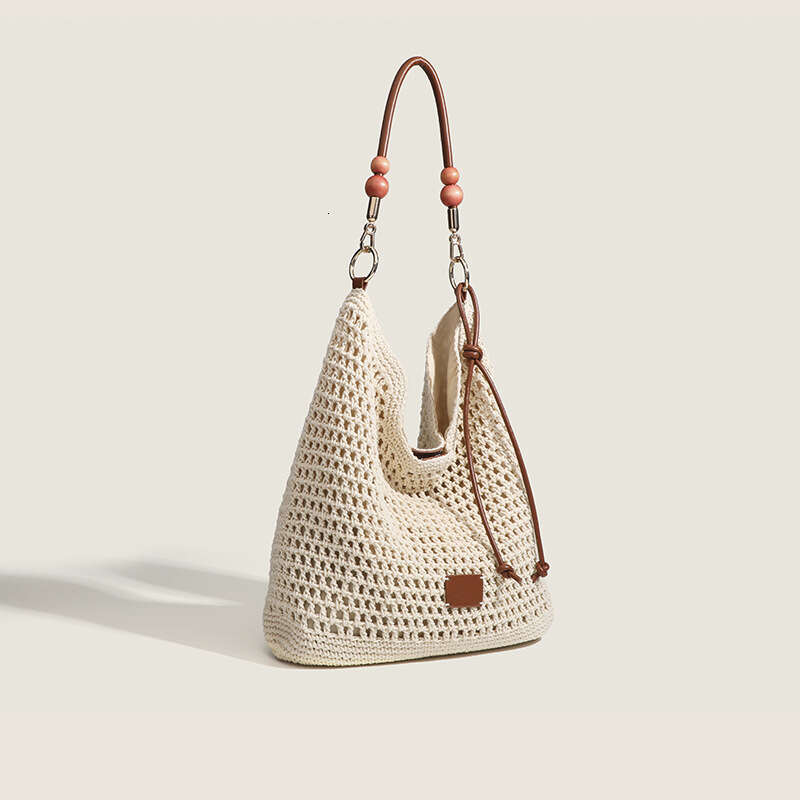 Hotwind Summer New Women's Pastoral Hollow Shoulder Bag Vacation Style Large Capacity Handbag