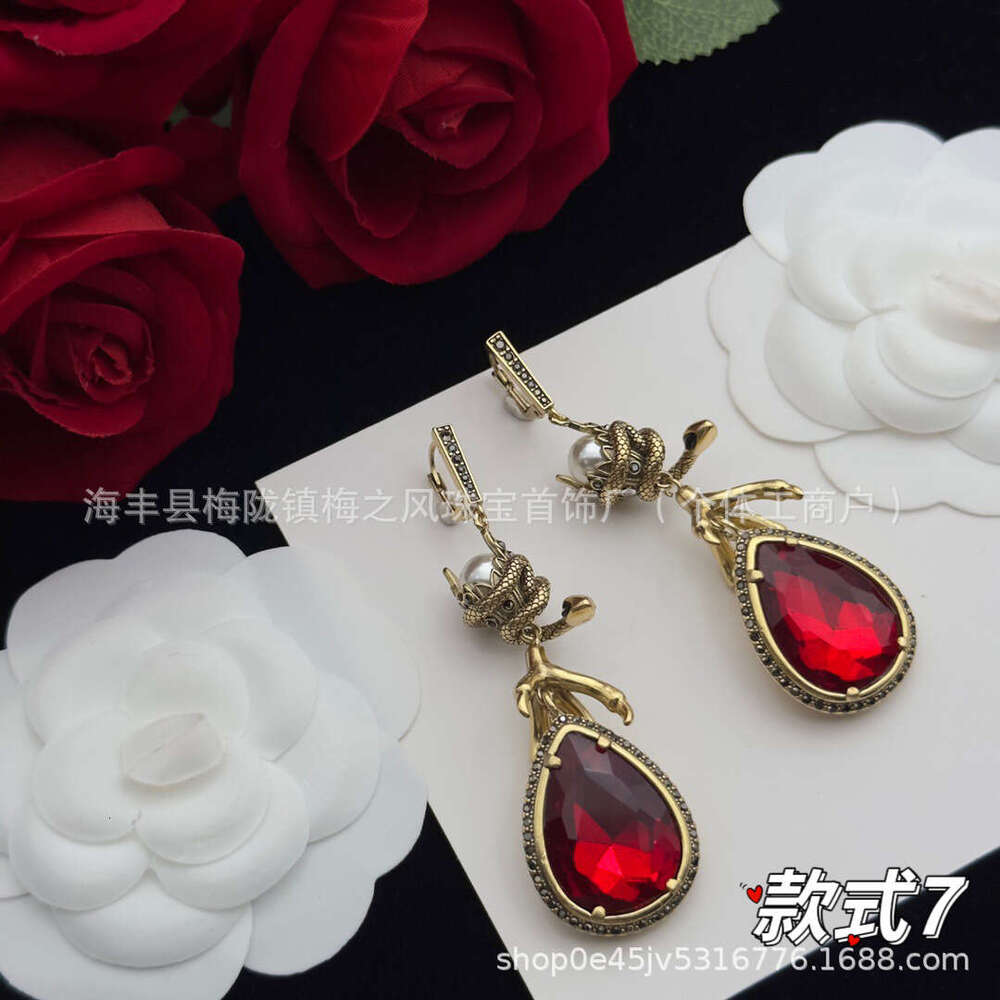 Upmarket Maijia High Version Ghost Skull Head Brass Material Spirit Snake Eagle Claw Exaggerated Long Earrings Sier Needle