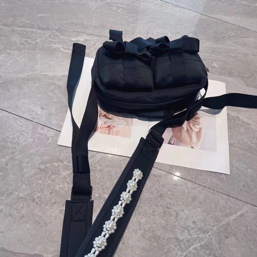 Free shipping designer bag 2023 Autumn New Casual Trendy Cool Sweet Jubilee Hot Girl Bag Pearl Bowknot Shoulder Bag Crossbody Bag Multi-pocket Women