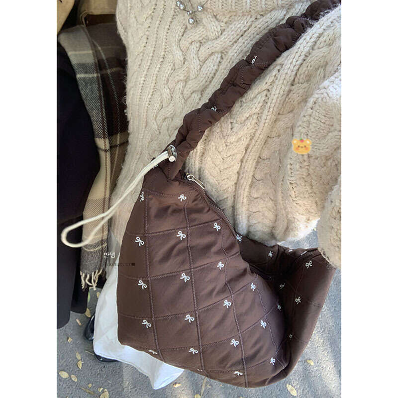 Niche Winter designer bag Down for Women 2024 New Korean Style Nylon Dumpling Versatile Crossbody Shoulder Underarm Bag